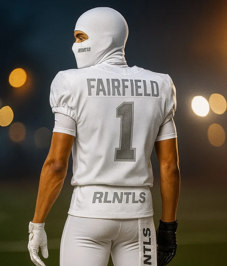 All-white game uniform under stadium lights